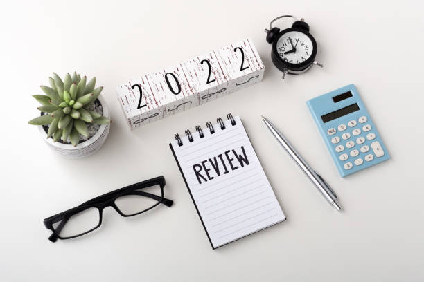 istock 2022 review and assessment concept with notebook and calculator 1344252841