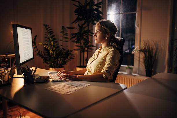 istock Business woman working late in office 1344254166