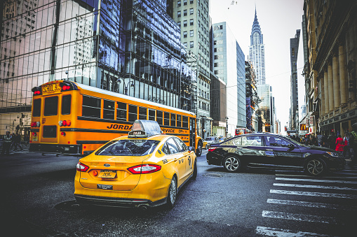 New York City, USA. November 2019: New York City yellow cabs at Lexington Ave at East 42nd street.
