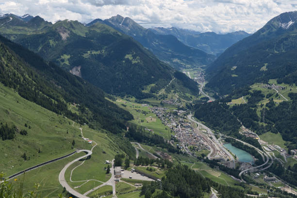 istock Panorama view of a valley in the Alps 1344255736