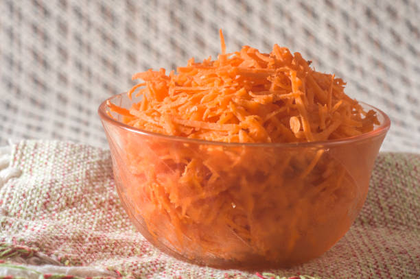 istock grated carrot in a bowl copy space 1344256959