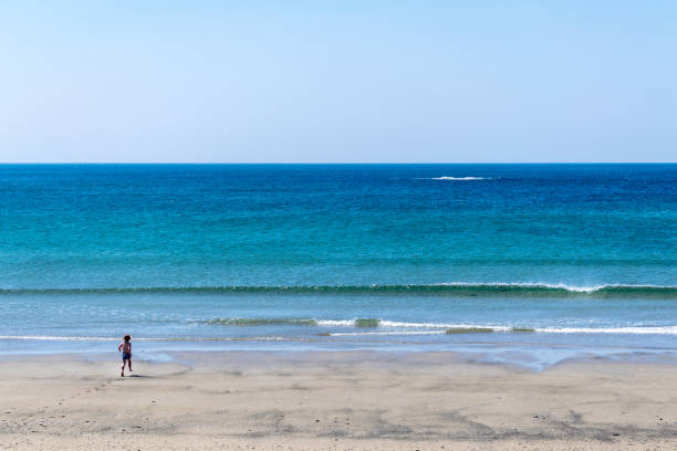 istock Running to the blue sea 1344257058