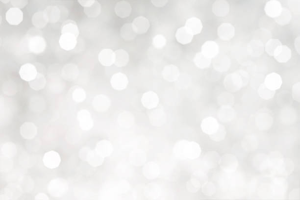 White Bokeh Lights Abstract Background White Bokeh Lights Abstract Background defocussed stock pictures, royalty-free photos & images