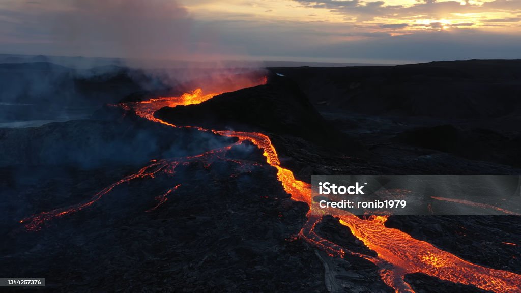 Aerial view over lava eruption, Mount Fagradalsfjall active, iceland 4K drone shot of lava spill out of the crater  Mount Fagradalsfjall, September 2021, Iceland Lava Stock Photo
