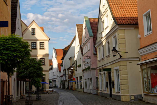 istock Beautiful alley between old style houses 1344258083