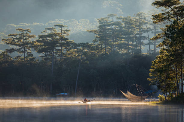 istock Fisherman in Tuyen Lam lake 1344258236