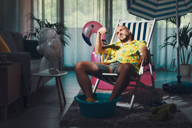 istock Bored man spending summer vacations at home 1344258287