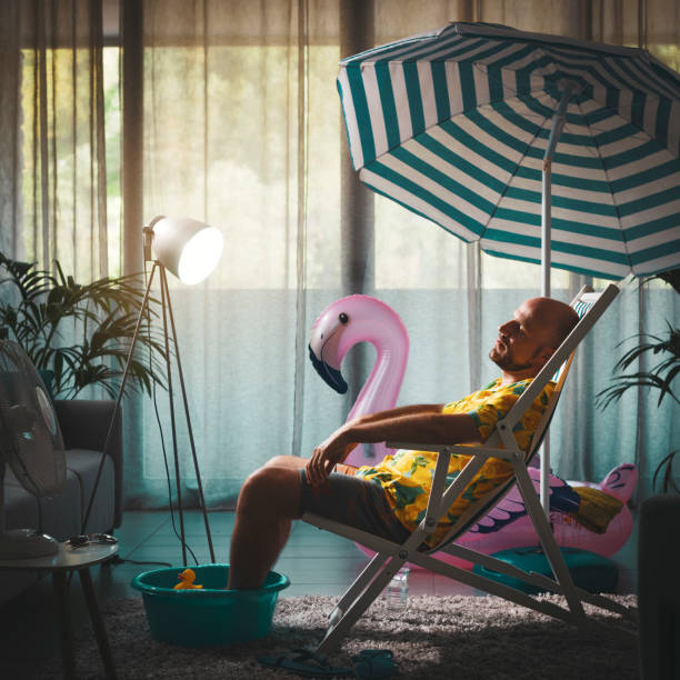 istock Bored man spending summer vacations at home 1344258504