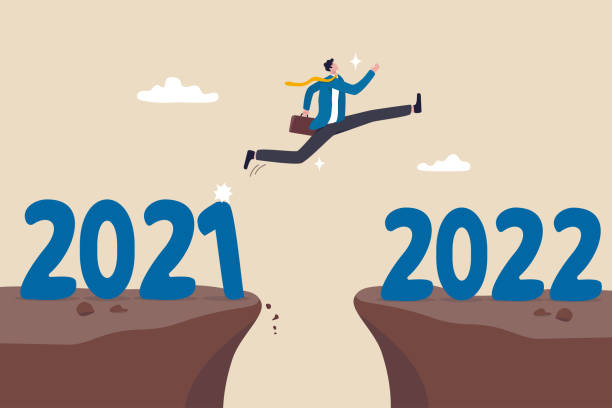 Year 2022 hope, new year resolution or success opportunity, change to new business bright future, overcome business difficulty concept, ambitious businessman jump over year gap from 2021 to 2022. Year 2022 hope, new year resolution or success opportunity, change to new business bright future, overcome business difficulty concept, ambitious businessman jump over year gap from 2021 to 2022. anticipation illustrations stock illustrations