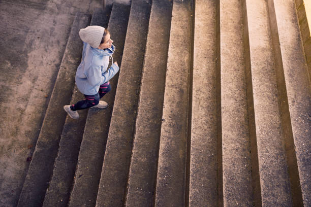 istock Slim woman jogging alone outside 1344267743
