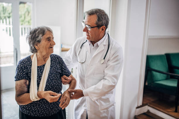 istock A doctor in a nursing home with a patient 1344268678