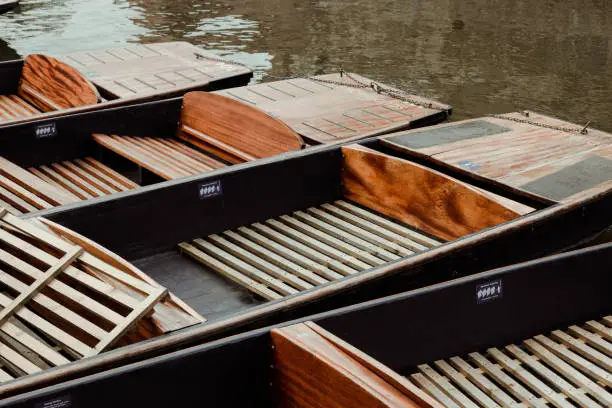 Punting boats in mooring on the River Cam