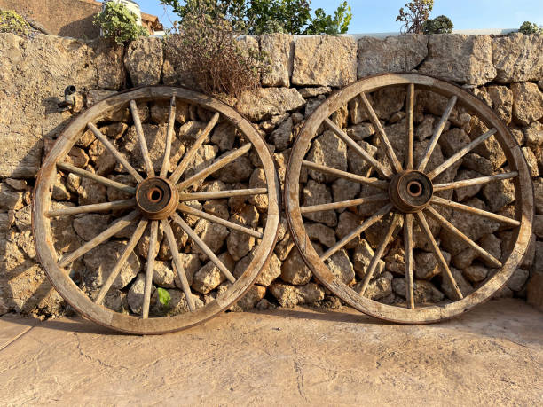 istock Cartwheels lean against a drystone wall, Majorca, Balearic islands, Spain 1344270823