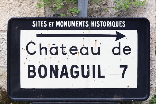 Bonaguil castle road sign and direction in Fumel, France
