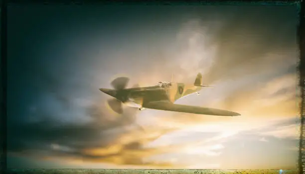 A classic Mk 1 Spitfire flies though the air. Model photography.