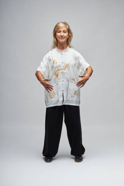 istock Mature blonde woman practicing Tai Chi 1344273216