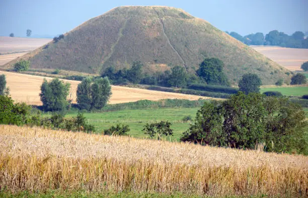 Famous ancient landmark in the countryside of southwest England,a prehistoric,man made chalk mound,the tallest in Europe.