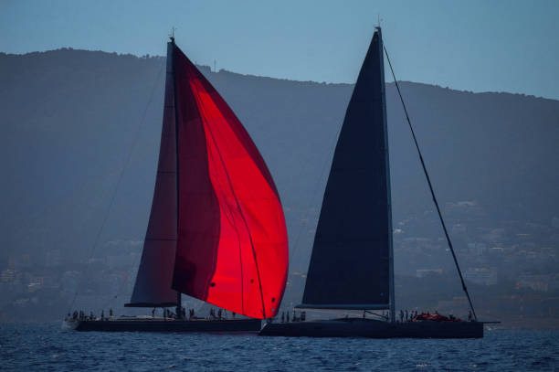 istock Two sailing yachts in sunset after maxi regatta 1344273516