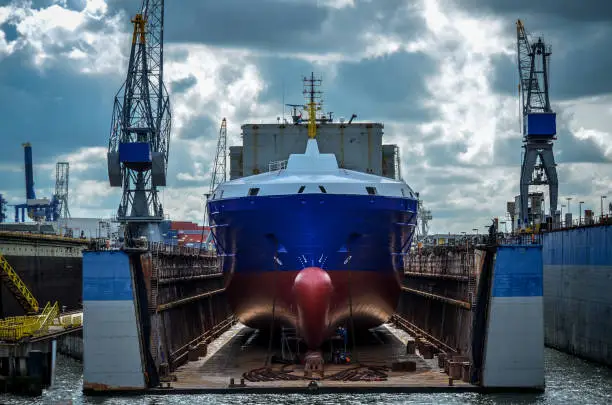 Big container ship gets repair work in a dry dock