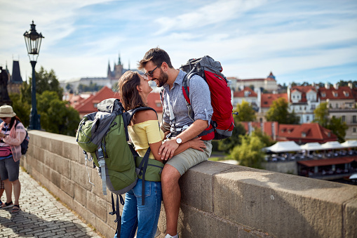 Tourist couple sightseeing in Prague; Traveller lifestyle
