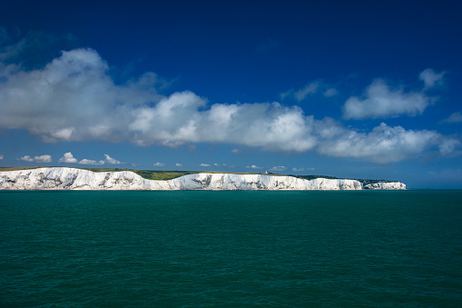 White cliffs  of Dover in sunlight and with turquoise sea