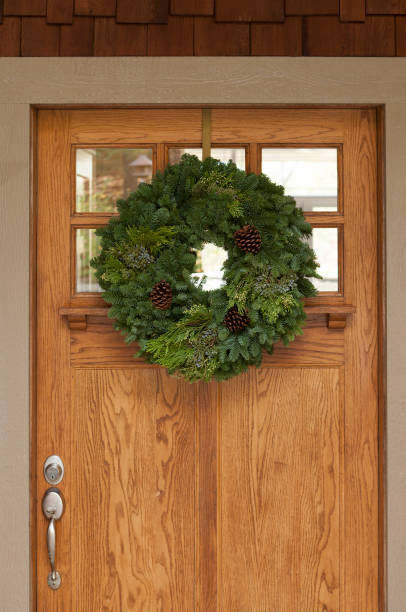 istock ChristmasWreathOnDoor1 1344279617