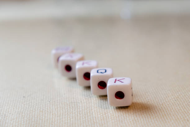 istock Row of five dice on white background with aces in the foreground. 1344285279