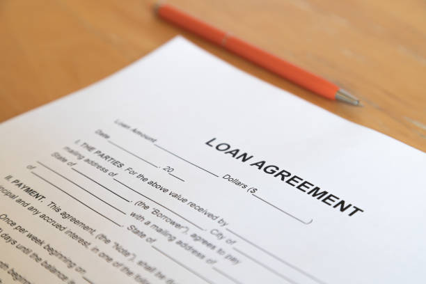 istock Loan agreement and pen 1344285487