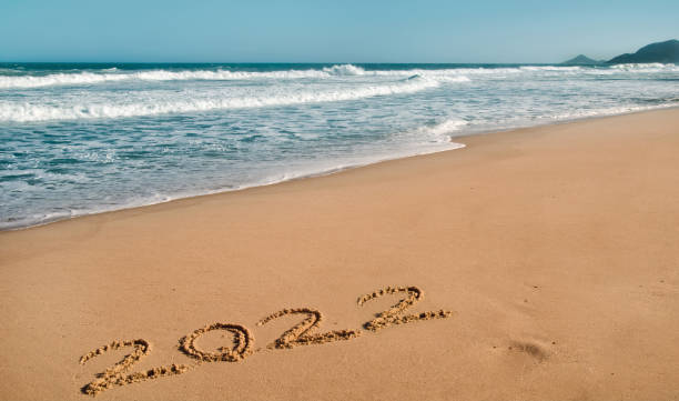 istock New Year 2022 on beach 1344287920
