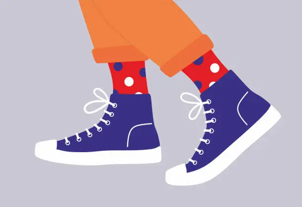 Vector illustration of Shoe pair, boots, footwear. Canvas shoes. Feet legs walking in sneakers with colored socks and jeans.