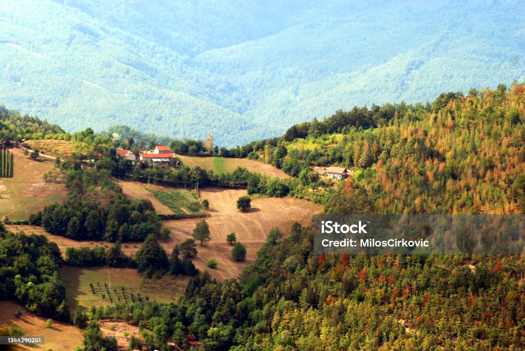 Western Serbia a view at a village near monastery Raca and Bajina Basta Western Serbia, a view at a village near monastery Raca and Bajina Basta Agricultural Field Stock Photo
