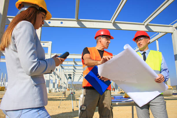 istock Group of builders and architect in hardhats 1344290740