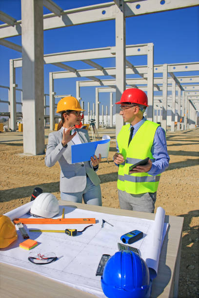 istock Group of builders and architect in hardhats 1344290754