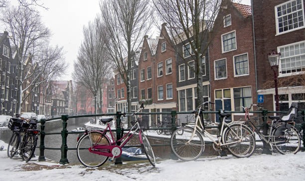 istock Snowing in Amsterdam the Netherlands in winter 1344291869
