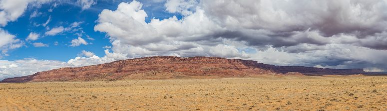 A panorama of the Vermillion Cliffs National Monument in the desert of northern Arizona on a bright, spring day.