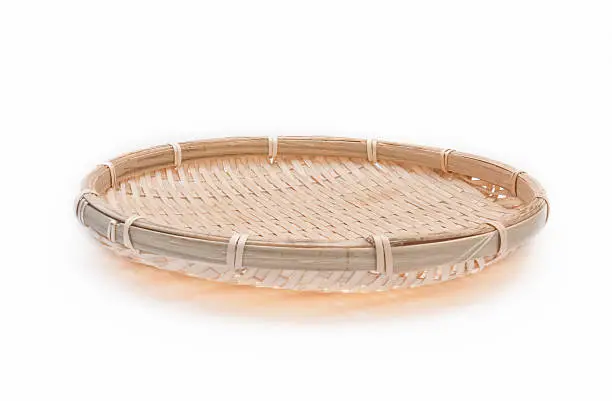 Handmade bamboo tray/basket on white background