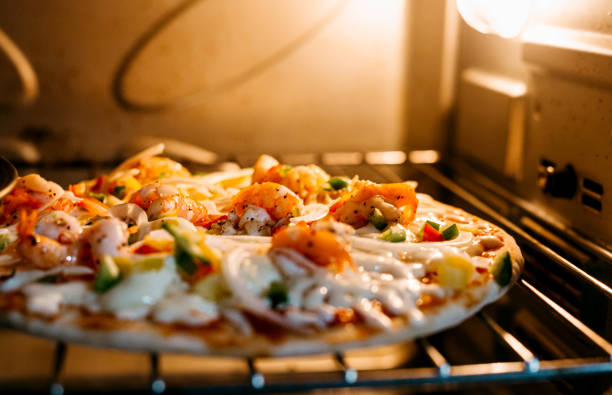 istock Grilled Shrimp Pizza in Oven 1344299921