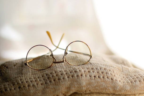 istock Pile of Sweaters and Glasses 1344306089