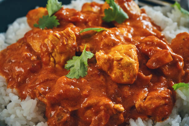 istock Indian Chicken Curry with Naan Bread and Poppadum 1344307319
