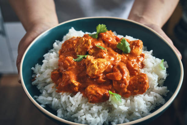 istock Indian Chicken Curry with Naan Bread and Poppadum 1344307347