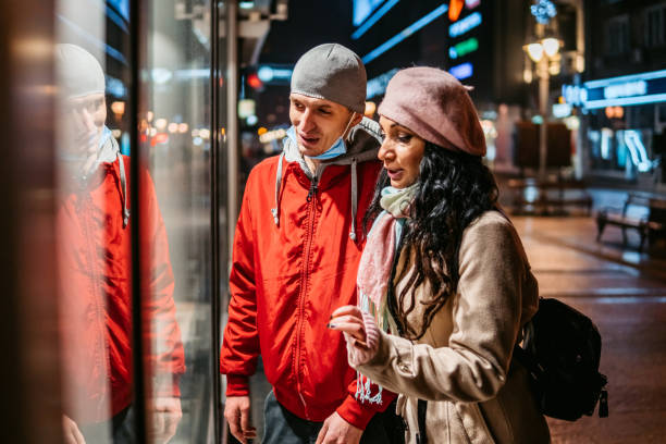 istock Couple window shopping at evening 1344309647