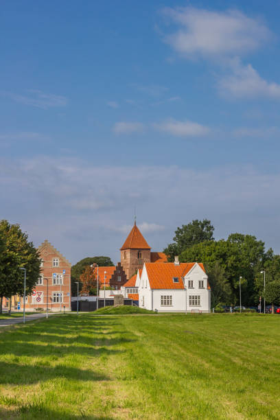 istock White house and tower of the monastery in Ribe 1344309767