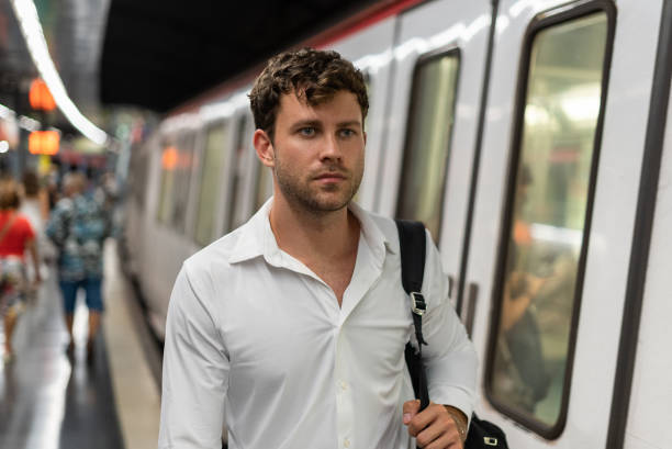 istock Businessman talking on underground station 1344310776