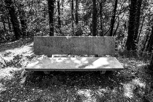 empty gray concrete bench in Tignale Brescia Italy