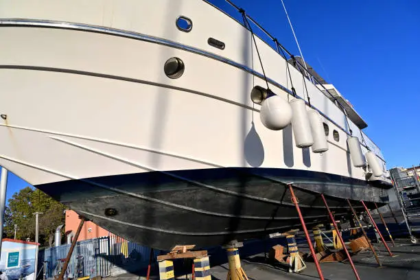 Photo of Fishing vessel, trawler being maintained in the harbour