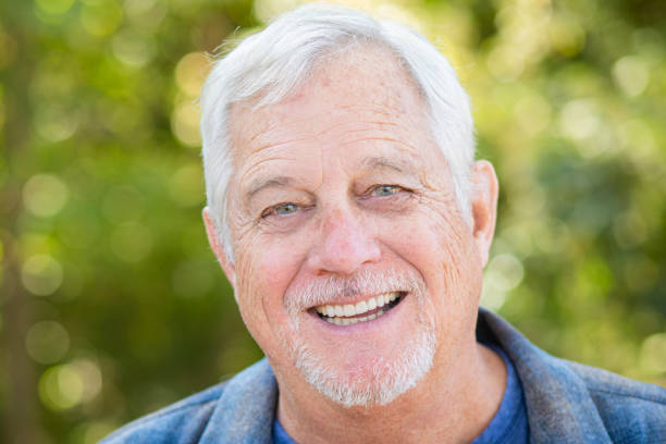 istock Happy senior man smiling 1344317147