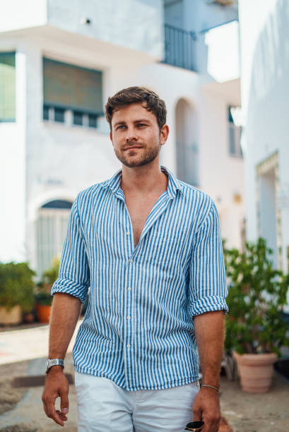 istock Dreamy man in sunlit yard 1344318186