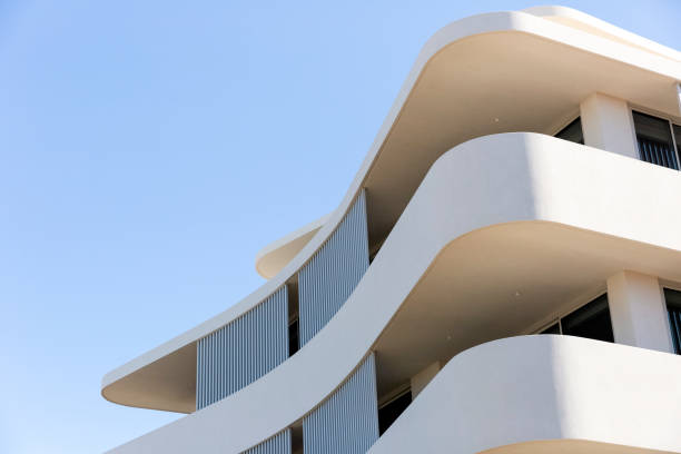 Facade of a modern apartment building. Lines patterns of facade with balcony of building view on exterior and architecture design concept