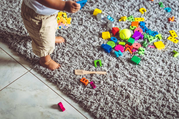 istock Messy toys and little child 1344327162