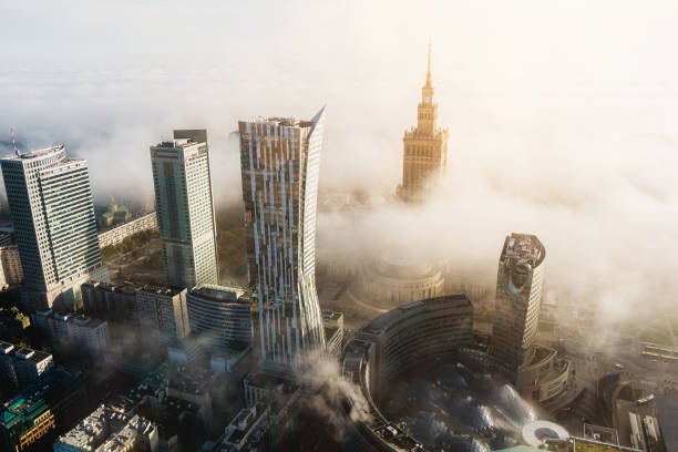 City Warsaw Poland, Warsaw, Śródmieście district, morning, clouds, fog.
On the right, in the distance, you can see the Palace of Culture and Science. warsaw stock pictures, royalty-free photos & images